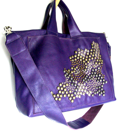 Purple studded leather handbag